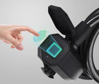 Hand unlocking TrekGlow smart bike lock with fingerprint sensor for urban rider safety
