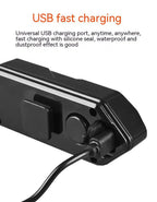 USB fast charging port with silicone seal on TrekGlow urban mobility safety gear, black device closeup