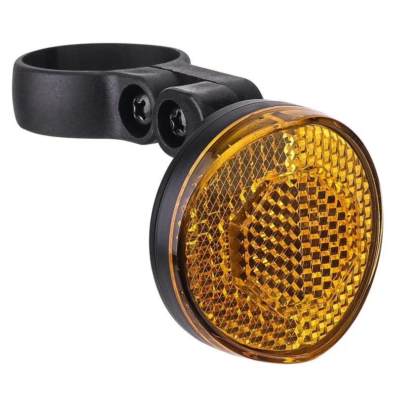 Yellow bike reflector with round lens and black mounting bracket for urban micro-mobility safety